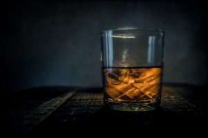 Glass of Scottish whisky under the stars